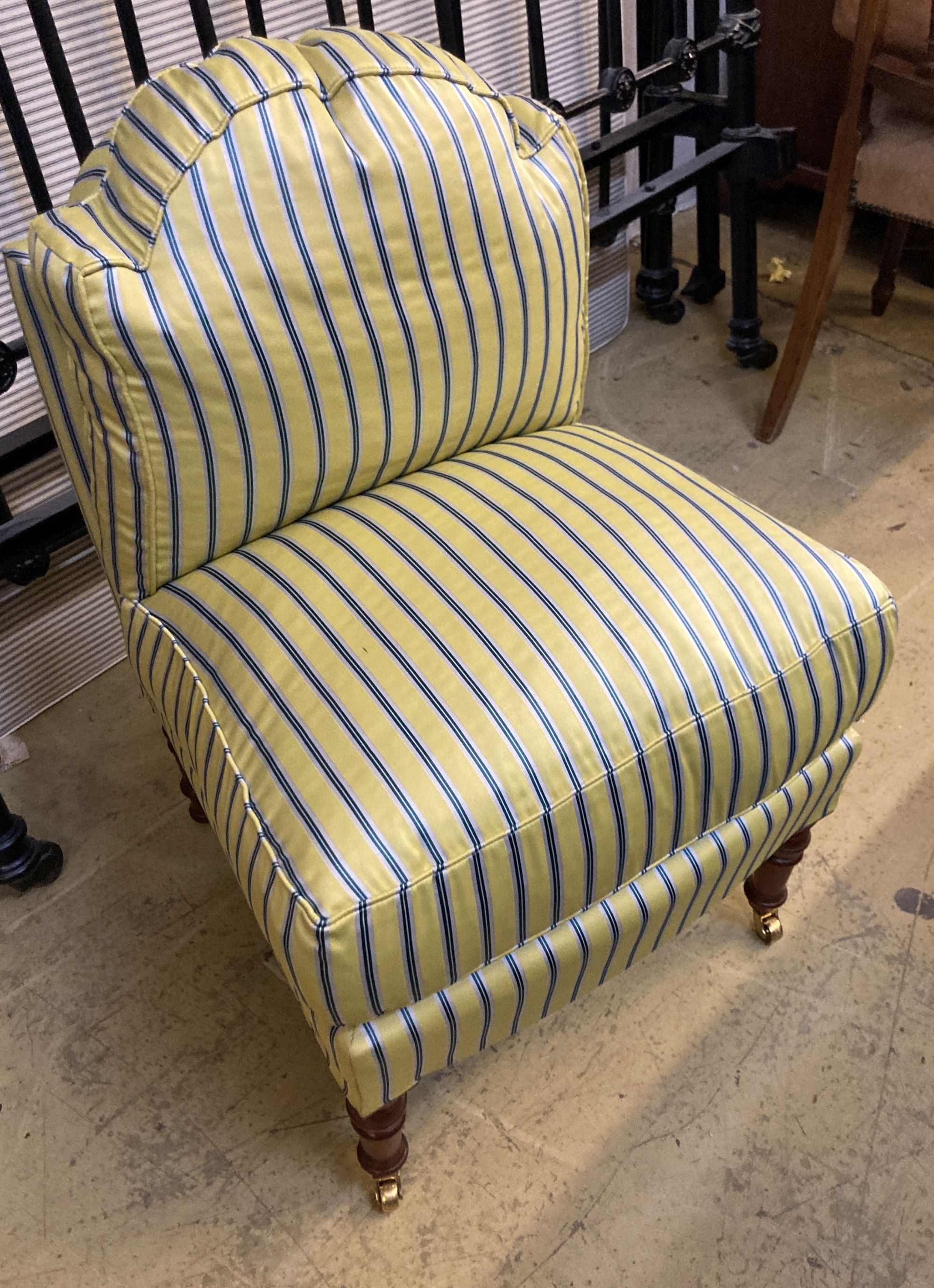 A modern Victorian style upholstered bedroom chair on turned tapered legs, width 50cm, depth 50cm, height 70cm